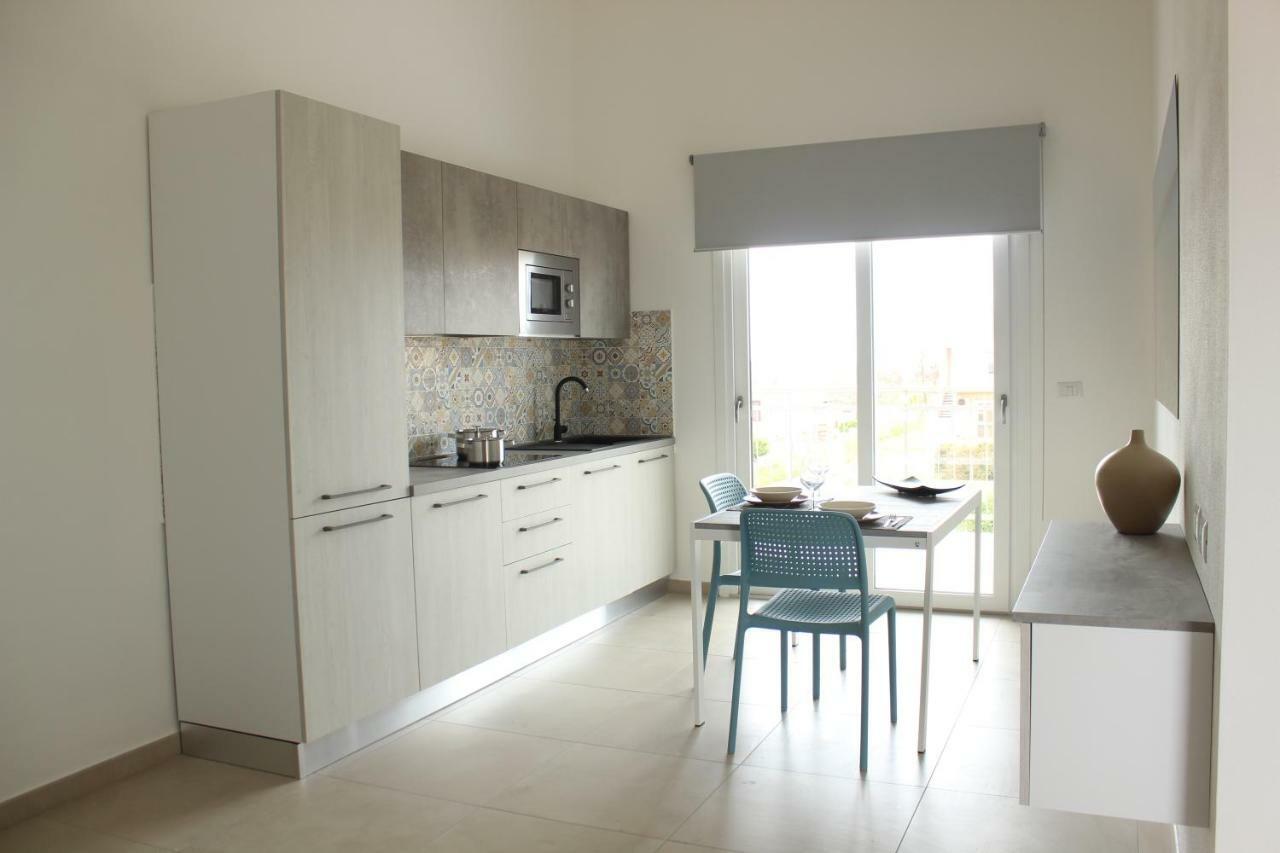 197 Pozzo San Nicola Aparthotel Стинтино Екстериор снимка